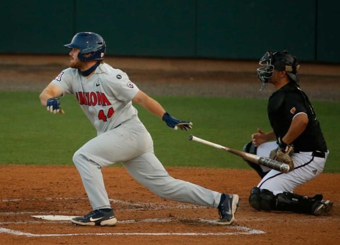 Arizona's Tanner O'Tremba (44) hits against ASU during game one of a series at Phoenix Municipal Stadium. (2021)